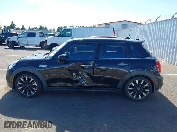 2015 MINI Hardtop 4 Door S z VIN WMWXU3C58F2B57218, wystawiony jako IAAI lot #42361437 z przebiegiem 96 984 mil mil oraz . Historia ofert i sprzedaży dostępna na DreamBid. Obrazek 14.