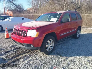 2010 Jeep Grand Cherokee Laredo with VIN 1J4PR4GK2AC135011, listed as a IAAI auction lot 41589996 with 111,536 mi miles. Bid and sale history available at carsss.com. Image 2.