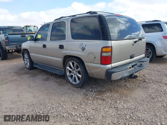 2002 Chevrolet Tahoe LS with VIN 1GNEC13Z02R244573, listed as a IAAI auction lot 41807744 with 245,788 mi miles and . Bid and sale history available at DreamBid. Image 3.