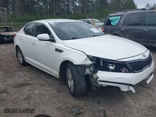 2015 Kia Optima LX with VIN KNAGM4A75F5632779, listed as a IAAI auction lot 41701231 with 174,458 mi miles. Bid and sale history available at carsss.com. Image 1.