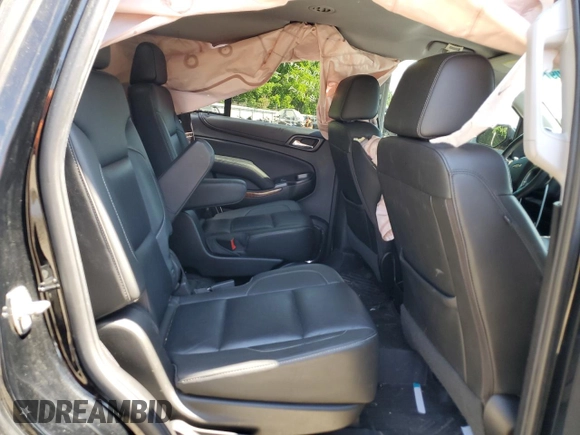 2018 Chevrolet Tahoe Premier with VIN 1GNSKCKC1JR133625, listed as a Copart auction lot 54900974 with 130,921 mi miles and Salvage title. Bid and sale history available at DreamBid. Image 11.
