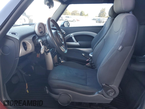 2007 MINI Convertible with VIN WMWRF33537TG17447, listed as a Copart auction lot 59015995 with 137,032 mi miles and Salvage title. Bid and sale history available at DreamBid. Image 7.