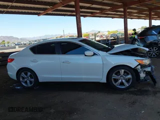 2014 Acura ILX z VIN 19VDE1F34EE015196, wystawiony jako IAAI lot #42107681 z przebiegiem 69 789 mil mil oraz . Historia ofert i sprzedaży dostępna na DreamBid. Obrazek 13.