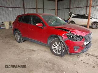 2016 Mazda CX-5 Touring with VIN JM3KE2CY0G0691927, listed as a IAAI auction lot 41611743 with 160,246 mi miles. Bid and sale history available at carsss.com. Image 1.