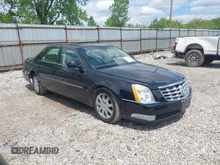 2006 Cadillac DTS 1SD z VIN 1G6KD57Y96U213474, wystawiony jako IAAI lot #42204202 z przebiegiem 102 627 mil mil oraz . Historia ofert i sprzedaży dostępna na DreamBid. Obrazek 1.
