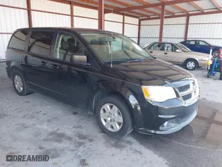 2012 Dodge Grand Caravan SXT with VIN 2C4RDGBG6CR402744, listed as a IAAI auction lot 41862962 with 115,864 mi miles. Bid and sale history available at carsss.com. Image 1.