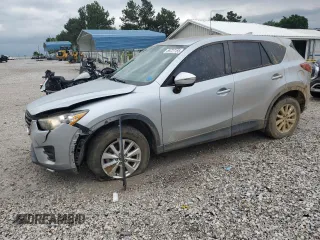 2016 Mazda CX-5 Sport with VIN JM3KE2BY8G0667408, listed as a Copart auction lot 59727155 with 158,767 mi miles and Salvage title. Bid and sale history available at DreamBid. Image 1.