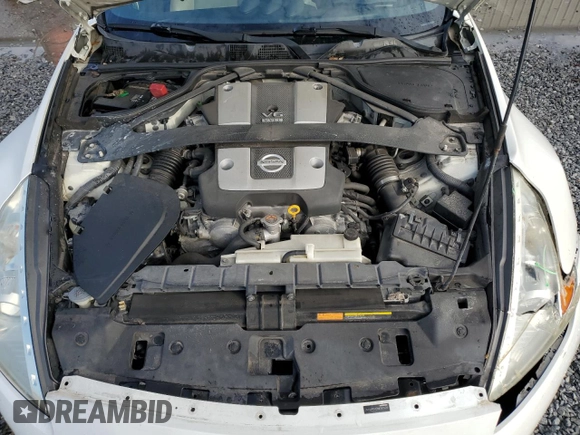 2010 Nissan 370Z Touring с VIN JN1AZ4FH2AM302093, выставлен на аукционе Copart как лот 86953624 с пробегом 138 845 миль миль и Списание • Salvage title. История ставок и продаж доступна на DreamBid. Изображение 11.