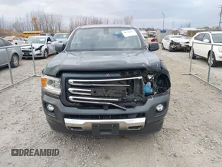 2016 GMC Canyon 4WD SLE with VIN 1GTG6CE38G1165896, listed as a IAAI auction lot 40716621 with 116,684 mi miles. Bid and sale history available at carsss.com. Image 12.