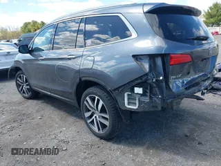 2016 Honda Pilot Elite with VIN 5FNYF6H06GB058392, listed as a IAAI auction lot 41983804 with 103,304 mi miles. Bid and sale history available at carsss.com. Image 3.