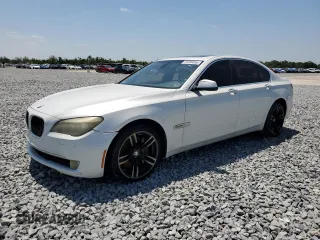 2012 BMW 7 Series 740i with VIN WBAKA4C59CDS99079, listed as a Copart auction lot 53299695 with 142,692 mi miles and Clean Title. Bid and sale history available at carsss.com. Image 1.