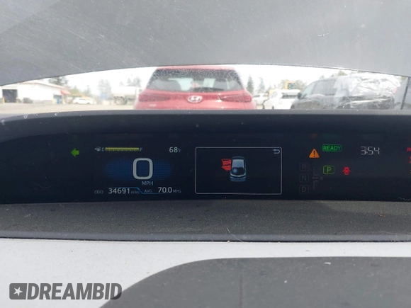 2021 Toyota Prius LE z VIN JTDKAMFP0M3179016, wystawiony jako IAAI lot #42204095 z przebiegiem 34 691 mil mil oraz . Historia ofert i sprzedaży dostępna na DreamBid. Obrazek 7.