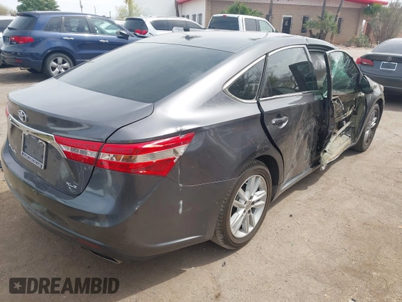 2014 Toyota Avalon Limited with VIN 4T1BK1EB1EU101787, listed as a IAAI auction lot 41949977 with 137,837 mi miles. Bid and sale history available at carsss.com. Image 4.