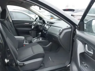 2017 Nissan Rogue SV with VIN KNMAT2MV5HP604465, listed as a IAAI auction lot 41463706 with 103,942 mi miles. Bid and sale history available at carsss.com. Image 5.