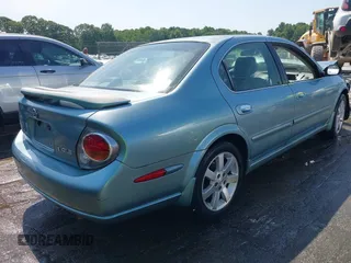 2002 Nissan Maxima GXE z VIN JN1DA31D62T444053, wystawiony jako IAAI lot #42307859 z przebiegiem Nie podano mil oraz . Historia ofert i sprzedaży dostępna na DreamBid. Obrazek 4.