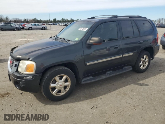 2003 GMC Envoy SLT with VIN 1GKDT13S232107429, listed as a Copart auction lot 48615135 with 245,956 mi miles and Clean Title. Bid and sale history available at carsss.com. Image 1.