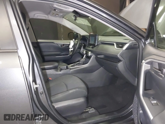 2019 Toyota RAV4 Hybrid LE with VIN JTMMWRFV8KD036053, listed as a IAAI auction lot 42502103 with 94,113 mi miles and . Bid and sale history available at DreamBid. Image 5.