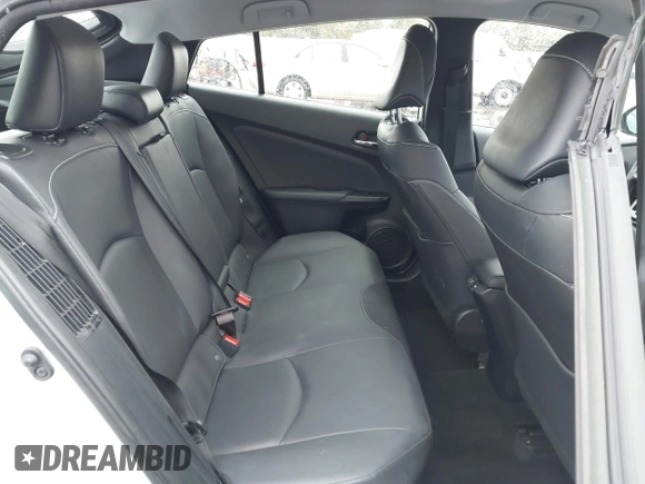 2021 Toyota Prius LE with VIN JTDKAMFP9M3170928, listed as a IAAI auction lot 42123934 with 58,293 mi miles and . Bid and sale history available at DreamBid. Image 8.