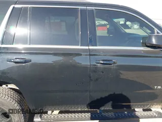 2017 Chevrolet Tahoe LT with VIN 1GNSKBKC6HR394138, listed as a IAAI auction lot 41852966 with 130,711 mi miles and . Bid and sale history available at DreamBid. Image 13.