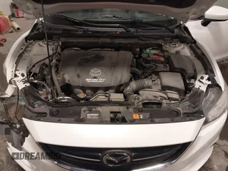2016 Mazda Mazda6 i Sport with VIN JM1GJ1U54G1473671, listed as a IAAI auction lot 41576038 with 88,386 mi miles. Bid and sale history available at carsss.com. Image 10.