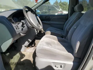 2002 Toyota Sienna LE with VIN 4T3ZF13C52U504138, listed as a Copart auction lot 74633984 with 154,406 mi miles and Salvage Title. Bid and sale history available at carsss.com. Image 7.