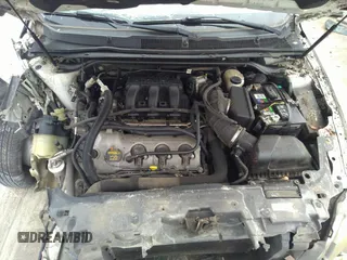 2011 Ford Taurus SE with VIN 1FAHP2DW3BG113398, listed as a IAAI auction lot 41617959 with 123,706 mi miles. Bid and sale history available at carsss.com. Image 10.
