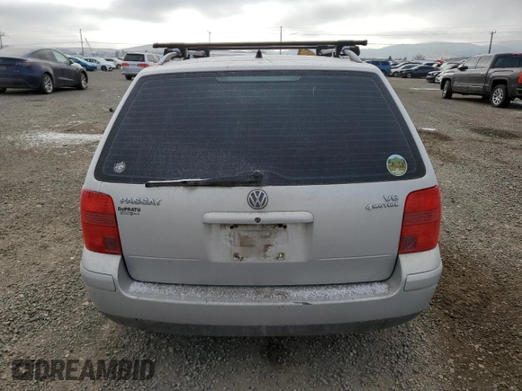 2000 Volkswagen Passat z VIN WVWRH23B6YE274455, wystawiony jako Copart lot #81634704 z przebiegiem 154 076 mil mil oraz Czysty tytuł • Clean title. Historia ofert i sprzedaży dostępna na DreamBid. Obrazek 6.