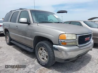 2002 GMC Yukon SLT z VIN 1GKEC13Z02R199471, wystawiony jako IAAI lot #42379318 z przebiegiem 212 157 mil mil oraz . Historia ofert i sprzedaży dostępna na DreamBid. Obrazek 1.
