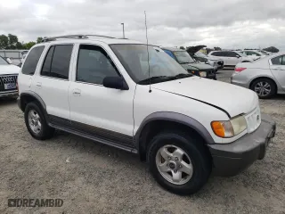 2002 Kia Sportage with VIN KNDJB723725141748, listed as a Copart auction lot 53556945 with 96,535 mi miles and Clean Title. Bid and sale history available at carsss.com. Image 4.