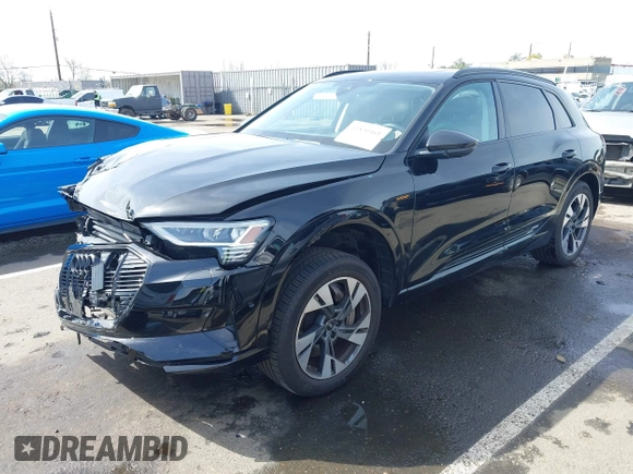 2022 Audi e-tron Premium with VIN WA1AAAGE6NB027461, listed as a IAAI auction lot 41830461 with 25,727 mi miles. Bid and sale history available at carsss.com. Image 2.