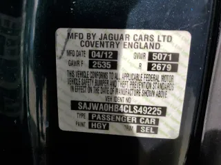 2012 Jaguar XF Portfolio with VIN SAJWA0HB4CLS49225, listed as a Copart auction lot 48070445 with 61,059 mi miles and Salvage Title. Bid and sale history available at carsss.com. Image 12.