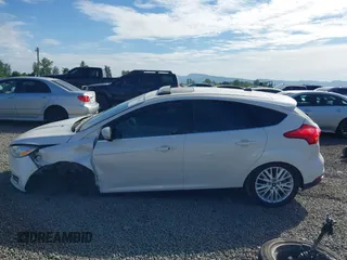 2017 Ford Focus Titanium with VIN 1FADP3N24HL308751, listed as a IAAI auction lot 42207247 with 109,736 mi miles and . Bid and sale history available at DreamBid. Image 15.