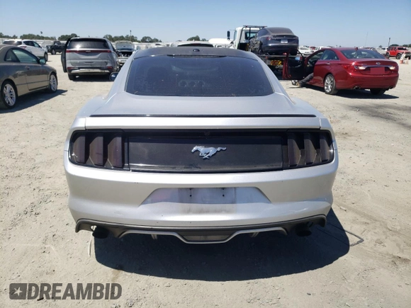 2015 Ford Mustang EcoBoost с VIN 1FA6P8TH6F5319751, выставлен на аукционе Copart как лот 61689905 с пробегом 122 704 миль миль и Списание • Salvage title. История ставок и продаж доступна на DreamBid. Изображение 6.