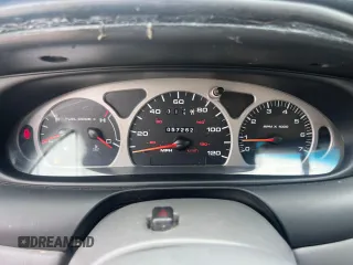 1999 Ford Taurus SE with VIN 1FAFP53SXXA145301, listed as a Copart auction lot 60351535 with 57,262 mi miles and Clean title. Bid and sale history available at DreamBid. Image 8.