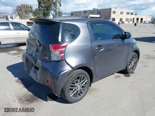 2012 Scion iQ with VIN JTNJJXB00CJ009265, listed as a IAAI auction lot 41742947 with 95,857 mi miles. Bid and sale history available at carsss.com. Image 4.