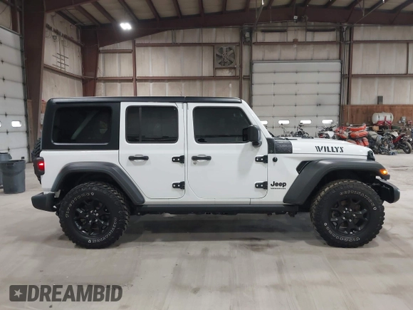 2023 Jeep Wrangler Sport S with VIN 1C4HJXDN2PW632584, listed as a IAAI auction lot 41965191 with 20,288 mi miles and . Bid and sale history available at DreamBid. Image 14.
