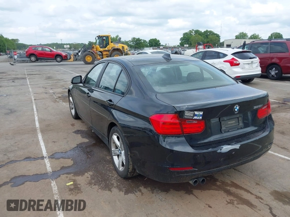 2012 BMW 3 Series 328i with VIN WBA3A5G51CNP17522, listed as a IAAI auction lot 42124868 with 154,385 mi miles and . Bid and sale history available at carsss.com. Image 3.