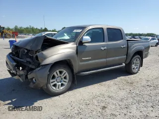 2015 Toyota Tacoma z VIN 3TMLU4EN3FM200857, wystawiony jako Copart lot #53662445 z przebiegiem 99 782 mil mil oraz Szkoda całkowita • Salvage title. Historia ofert i sprzedaży dostępna na DreamBid. Obrazek 1.