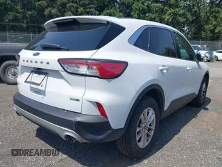 2020 Ford Escape SE with VIN 1FMCU9G67LUA79806, listed as a IAAI auction lot 42560963 with 103,070 mi miles and . Bid and sale history available at DreamBid. Image 4.