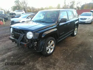 2014 Jeep Patriot Latitude with VIN 1C4NJRFB0ED799097, listed as a IAAI auction lot 40834502 with 192,940 mi miles. Bid and sale history available at carsss.com. Image 2.