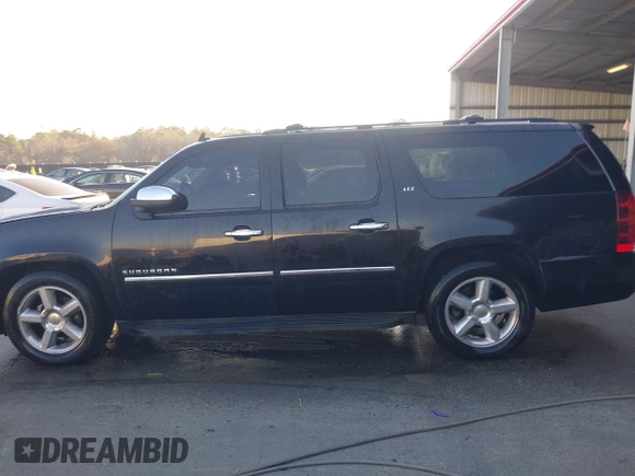 2010 Chevrolet Suburban LTZ with VIN 1GNUKKE37AR188966, listed as a IAAI auction lot 41833988 with 215,922 mi miles. Bid and sale history available at carsss.com. Image 14.