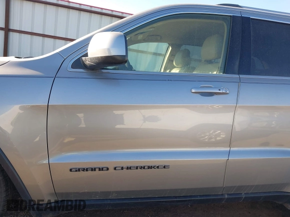 2018 Jeep Grand Cherokee Laredo E with VIN 1C4RJEAG9JC126080, listed as a IAAI auction lot 41355941 with 108,919 mi miles and . Bid and sale history available at DreamBid. Image 14.