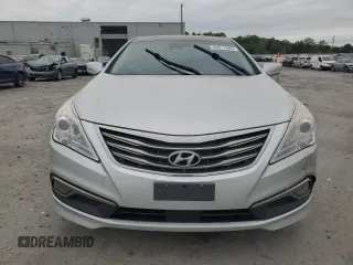 2016 Hyundai Azera Limited z VIN KMHFH4JG6GA518314, wystawiony jako Copart lot #53917085 z przebiegiem 192 713 mil mil oraz Szkoda całkowita • Salvage title. Historia ofert i sprzedaży dostępna na DreamBid. Obrazek 5.
