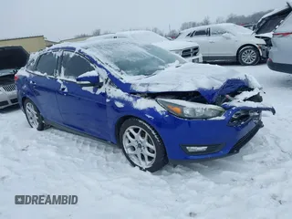 2015 Ford Focus SE with VIN 1FADP3F23FL361274, listed as a IAAI auction lot 41292796 with 102,741 mi miles. Bid and sale history available at carsss.com. Image 1.