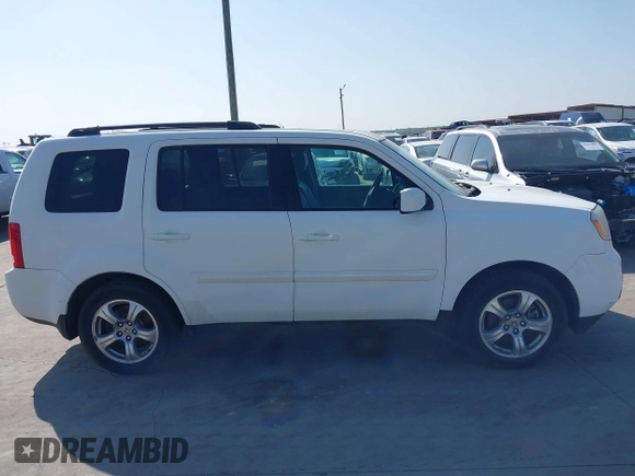 2015 Honda Pilot EX-L with VIN 5FNYF4H56FB061663, listed as a IAAI auction lot 41873152 with 211,876 mi miles and . Bid and sale history available at carsss.com. Image 13.