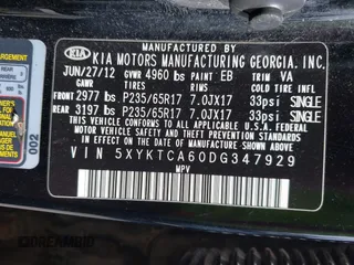 2013 Kia Sorento LX with VIN 5XYKTCA60DG347929, listed as a IAAI auction lot 42144507 with 210,216 mi miles. Bid and sale history available at carsss.com. Image 9.