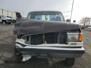 1991 Ford F-250 z VIN 1FTHX26G1MKB21130, wystawiony jako Copart lot #42222245 z przebiegiem 13 849 mil mil oraz Szkoda całkowita • Salvage title. Historia ofert i sprzedaży dostępna na DreamBid. Obrazek 5.