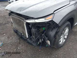 2019 Hyundai Santa Fe SEL z VIN 5NMS3CAD7KH035429, wystawiony jako IAAI lot #42323641 z przebiegiem 60 909 mil mil oraz . Historia ofert i sprzedaży dostępna na DreamBid. Obrazek 21.