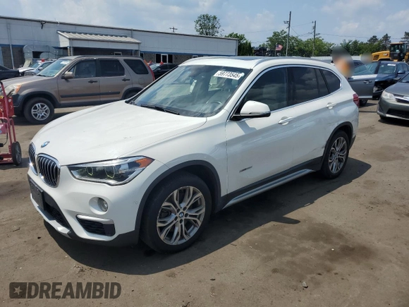 2017 BMW X1 xDrive28i with VIN WBXHT3Z3XH4A55624, listed as a Copart auction lot 59773545 with 140,251 mi miles and Salvage title. Bid and sale history available at DreamBid. Image 1.