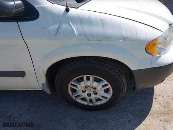 2005 Dodge Caravan SE with VIN 1D4GP25R55B298363, listed as a IAAI auction lot 42068006 with 306,997 mi miles. Bid and sale history available at carsss.com. Image 12.